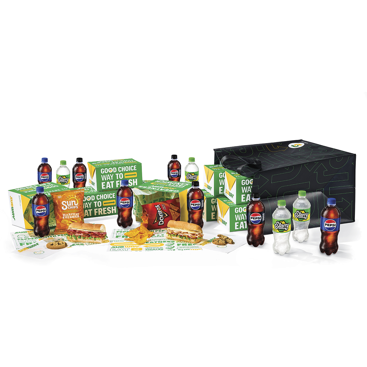 Subway® Catering subs, chips, cookies and Pepsi products on countertop.